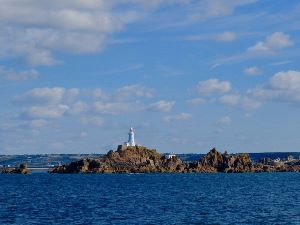 La Corbière Lighthouse located at extreme south-western point of Jersey in St. Brélade. 19 metres high, opened in 1874.