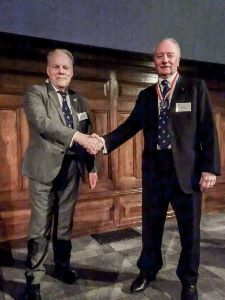 2025 IESF (British Section) President, Roger Venables hands over to 2026 President, John Beck.