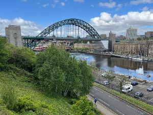 The Tyne Bridge opened in 1928. Designed by Mott, Hay and Anderson and constructed by Dorman Long and Company. Total length 389m with longest span 161.8m and 26m clearance. 7,010 tons structural steel and piers constructed of Cornish granite.