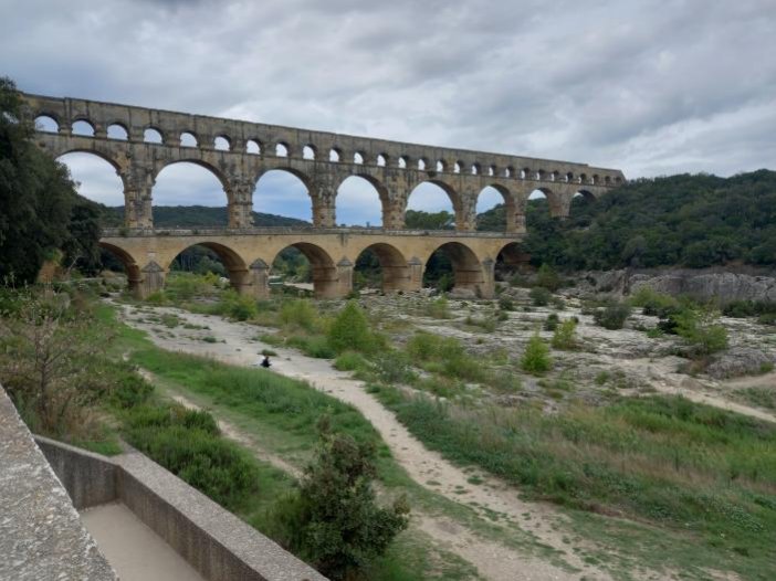 The three tiers of arches of the Pont du Gard Roman aqueduct over the River Gardon