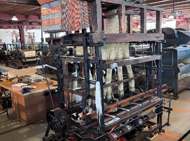 A 1900 ribbon loom with Jacquard punched cards on display at the Science and Industry Museum, Manchester