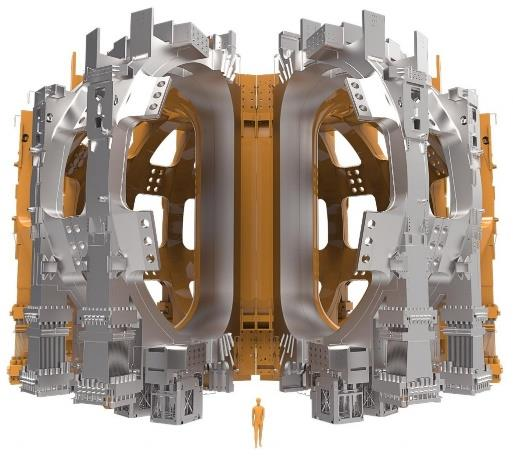Render of the ITER vacuum vessel sectors with a human figure for scale